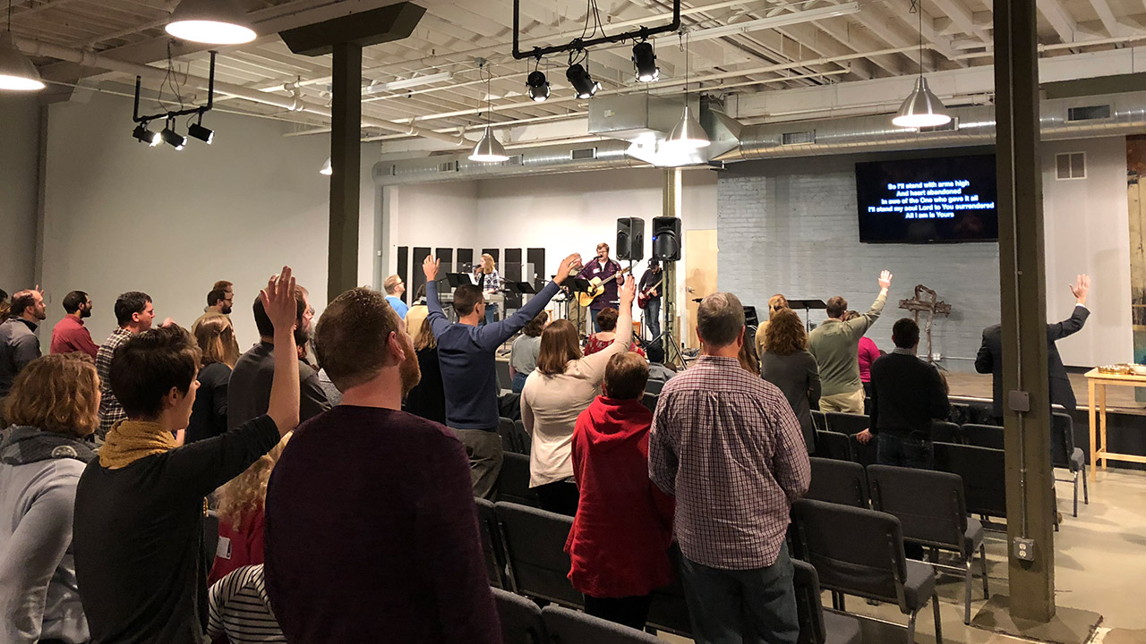 Congregation worshipping together on a Sunday morning in Minneapolis